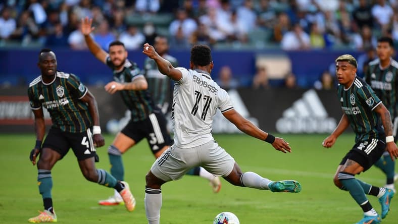 Jul 13, 2022; Carson, California, USA; San Jose Earthquakes forward Jeremy Ebobisse (11) takes a shot on goal to score against the Los Angeles Galaxy during the first half at Dignity Health Sports Park. Mandatory Credit: Gary A. Vasquez-USA TODAY Sports