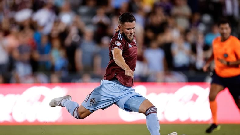 Jul 13, 2022; Commerce City, Colorado, USA; Colorado Rapids defender Keegan Rosenberry (2) kicks the ball in the second half against Orlando City SC at Dick's Sporting Goods Park. Mandatory Credit: Isaiah J. Downing-USA TODAY Sports