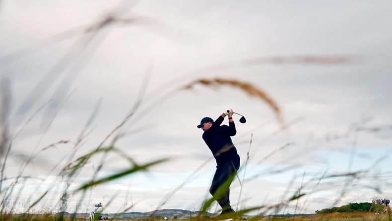 Jul 14, 2022; St. Andrews, SCT; Phil Mickelson tees off on the 17th hole during the first round of the 150th Open Championship golf tournament at St. Andrews Old Course. Mandatory Credit: Rob Schumacher-USA TODAY Sports
