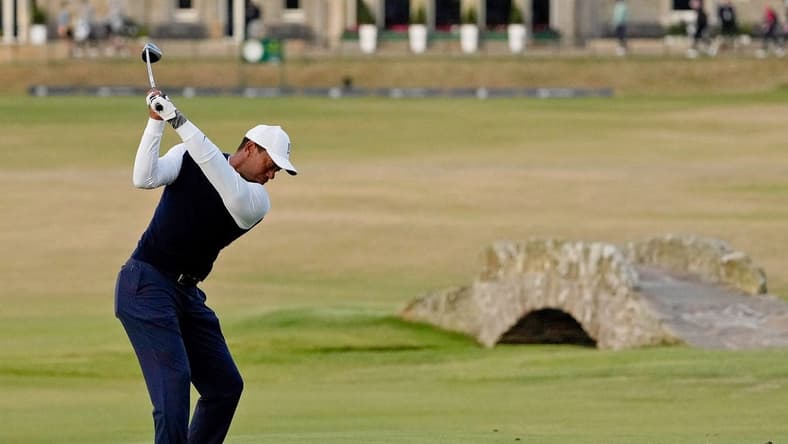 Jul 14, 2022; St. Andrews, SCT; Tiger Woods tees off on the 18th hole during the first round of the 150th Open Championship golf tournament at St. Andrews Old Course. Mandatory Credit: Michael Madrid-USA TODAY Sports