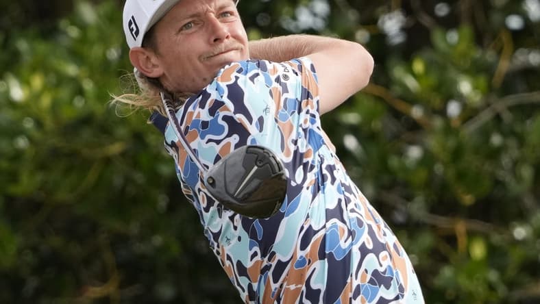 Jul 16, 2022; St. Andrews, Fife, SCT; Cameron Smith hits his tee shot on the 3rd hole during the third round of the 150th Open Championship golf tournament. Mandatory Credit: Michael Madrid-USA TODAY Sports