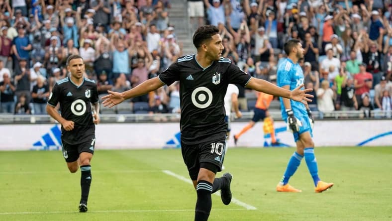 Jul 16, 2022; Saint Paul, Minnesota, USA; Minnesota United midfielder Emanuel Reynoso (10) celebrates after a goal against D.C. United in the first half at Allianz Field. Mandatory Credit: Matt Blewett-USA TODAY Sports