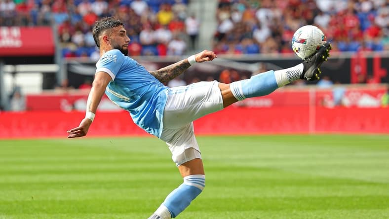 Jul 17, 2022; Harrison, New Jersey, USA; New York City FC midfielder Valentin Castellanos (11) kicks the ball against the New York Red Bulls during the second half at Red Bull Arena. Mandatory Credit: Vincent Carchietta-USA TODAY Sports