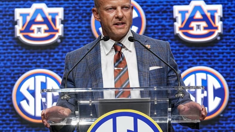 Jul 21, 2022; Atlanta, GA, USA; Auburn Tigers head coach Bryan Harsin shown on the stage during SEC Media Days at the College Football Hall of Fame. Mandatory Credit: Dale Zanine-USA TODAY Sports