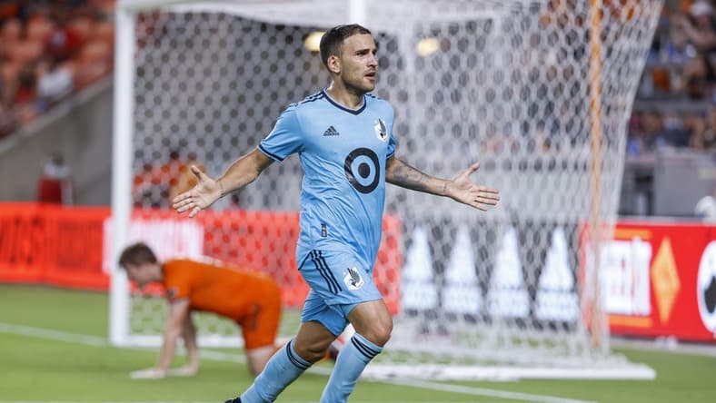 Jul 23, 2022; Houston, Texas, USA; Minnesota United FC midfielder Franco Fragapane (7) celebrates after scoring a goal during the first half against the Houston Dynamo FC at PNC Stadium. Mandatory Credit: Troy Taormina-USA TODAY Sports