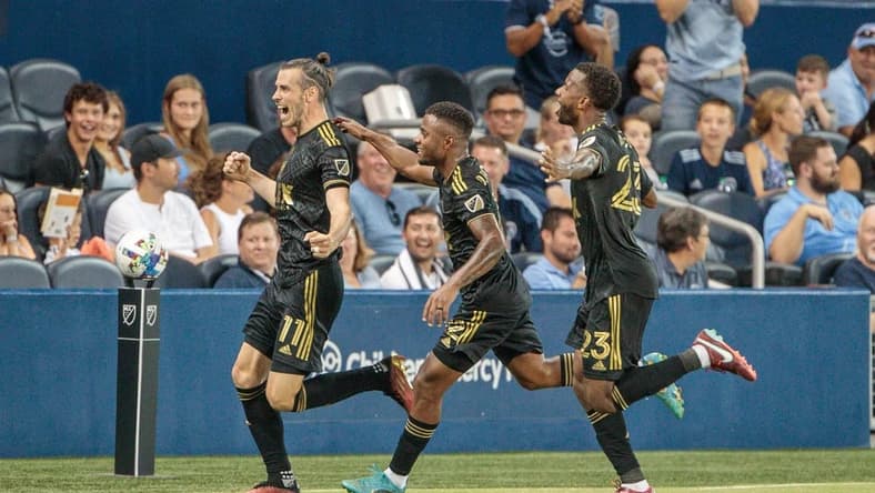 Jul 23, 2022; Kansas City, Kansas, USA; Los Angeles FC midfielder Jose Cifuentes (11) celebrates after scoring a goal against Sporting Kansas City during the second half at Children's Mercy Park. Mandatory Credit: William Purnell-USA TODAY Sports