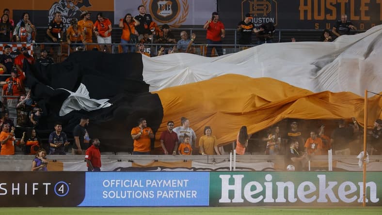Jul 23, 2022; Houston, Texas, USA; Fans display a tifo after a Houston Dynamo FC goal during the second half against the Minnesota United FC at PNC Stadium. Mandatory Credit: Troy Taormina-USA TODAY Sports