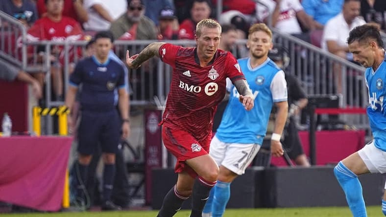 Jul 23, 2022; Toronto, Ontario, CAN; Toronto FC midfielder Federico Bernardeschi (10) chases after the ball against Charlotte FC at BMO Field. Mandatory Credit: John E. Sokolowski-USA TODAY Sports