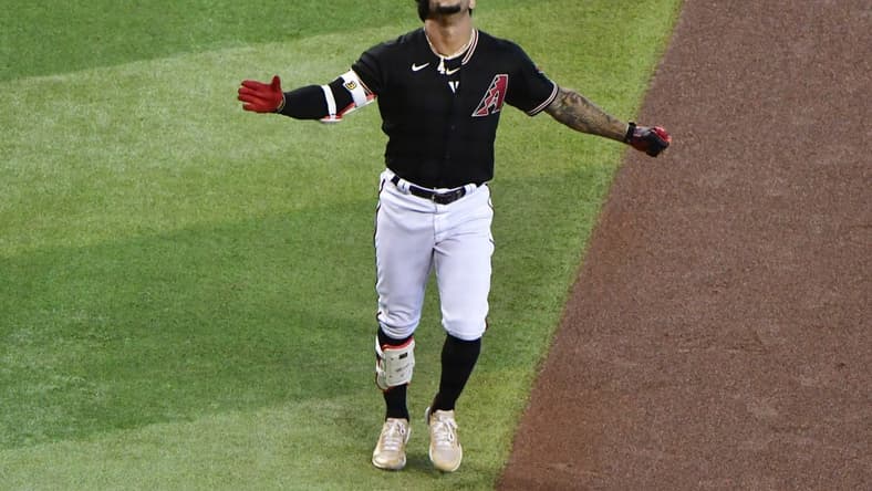 Jul 27, 2022; Phoenix, Arizona, USA; Arizona Diamondbacks second baseman Ketel Marte (4) celebrates after hitting a solo home run in the first inning against the San Francisco Giants at Chase Field. Mandatory Credit: Matt Kartozian-USA TODAY Sports