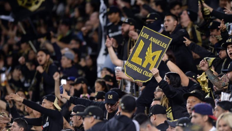 Mar 23, 2019; Los Angeles, CA, USA; A sign with the Los Angeles FC logo is held by a fan in the stands during the second half against the Real Salt Lake at Banc of California Stadium. Mandatory Credit: Orlando Ramirez-USA TODAY Sports