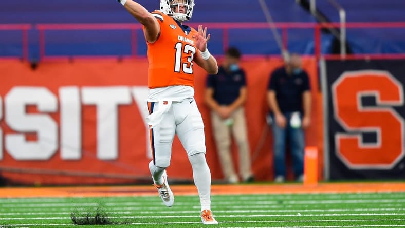 Oct 10, 2020; Syracuse, New York, USA; Syracuse Orange quarterback Tommy DeVito (13) passes the ball against the Duke Blue Devils during the second quarter at the Carrier Dome. Mandatory Credit: Rich Barnes-USA TODAY Sports