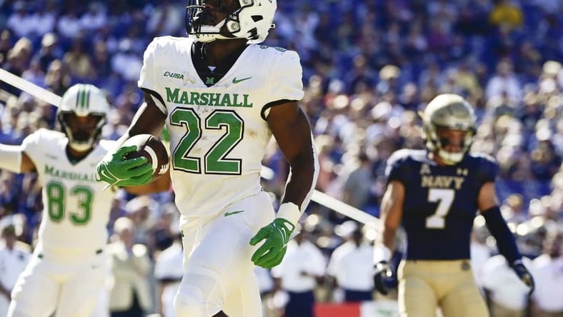 Sep 4, 2021; Annapolis, Maryland, USA;  Marshall Thundering Herd running back Rasheen Ali (22) reacts after scoring a first half touchdown against the Navy Midshipmen at Navy-Marine Corps Memorial Stadium. Mandatory Credit: Tommy Gilligan-USA TODAY Sports