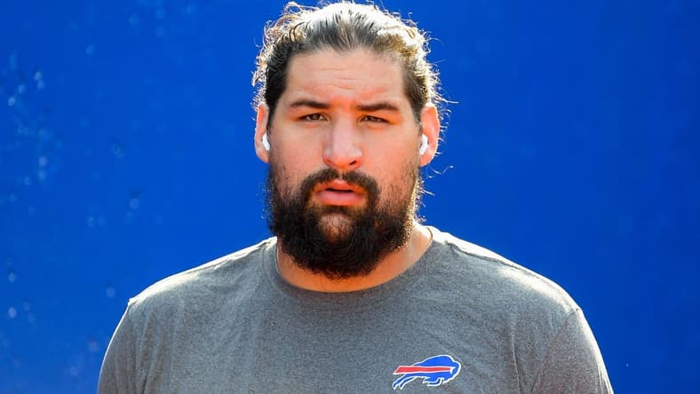 Aug 28, 2021; Orchard Park, New York, USA; Buffalo Bills offensive guard Jon Feliciano (76) walks to the field prior to the game against the Green Bay Packers at Highmark Stadium. Mandatory Credit: Rich Barnes-USA TODAY Sports