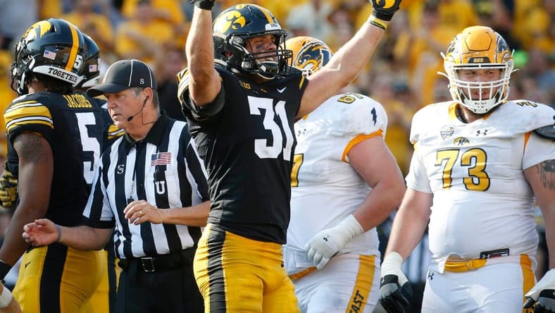 Iowa junior linebacker Jack Campbell reacts after tackling Kent State quarterback Dustin Crum in the third quarter at Kinnick Stadium in Iowa City on Saturday, Sept. 18, 2021.

20210918 Iowavskentstate