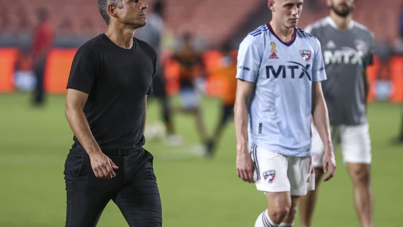 Sep 18, 2021; Houston, Texas, USA; FC Dallas head coach Luchi Gonzalez walks off the field after the match against the Houston Dynamo FC at BBVA Stadium. Mandatory Credit: Troy Taormina-USA TODAY Sports