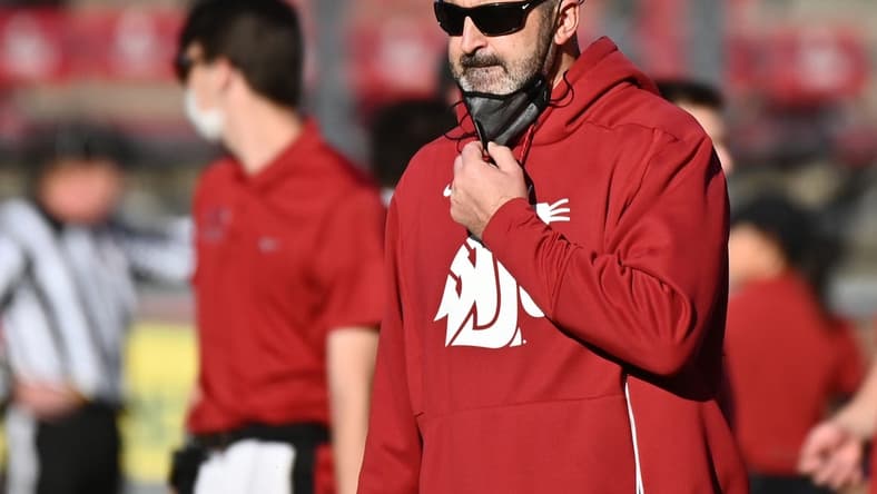 Oct 16, 2021; Pullman, Washington, USA; Washington State Cougars head coach Nick Rolovich looks on during warms before a game against the Stanford Cardinal at Gesa Field at Martin Stadium. Mandatory Credit: James Snook-USA TODAY Sports