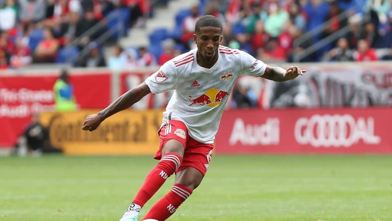 Oct 17, 2021; Harrison, New Jersey, USA; New York Red Bulls defender Kyle Duncan (6) moves the ball during the firs half against New York City FC at Red Bull Arena. Mandatory Credit: Tom Horak-USA TODAY Sports