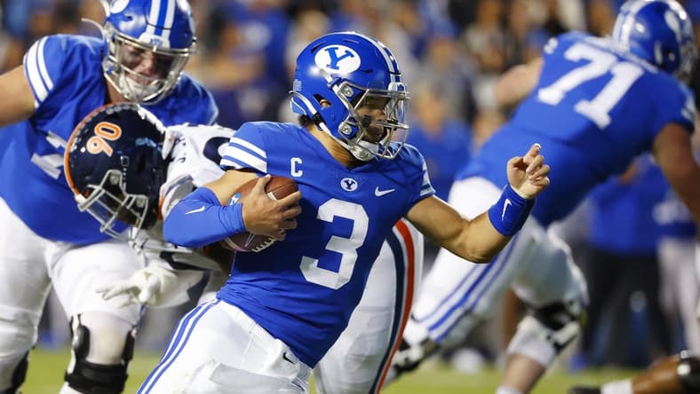 Oct 30, 2021; Provo, Utah, USA;  Brigham Young Cougars quarterback Jaren Hall (3) runs the ball in the first quarter against the Virginia Cavaliers at LaVell Edwards Stadium. Mandatory Credit: Jeffrey Swinger-USA TODAY Sports