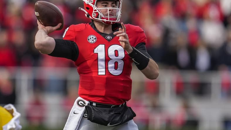 Nov 6, 2021; Athens, Georgia, USA; Georgia Bulldogs quarterback JT Daniels (18) passes the ball against the Missouri Tigers during the second half at Sanford Stadium. Mandatory Credit: Dale Zanine-USA TODAY Sports