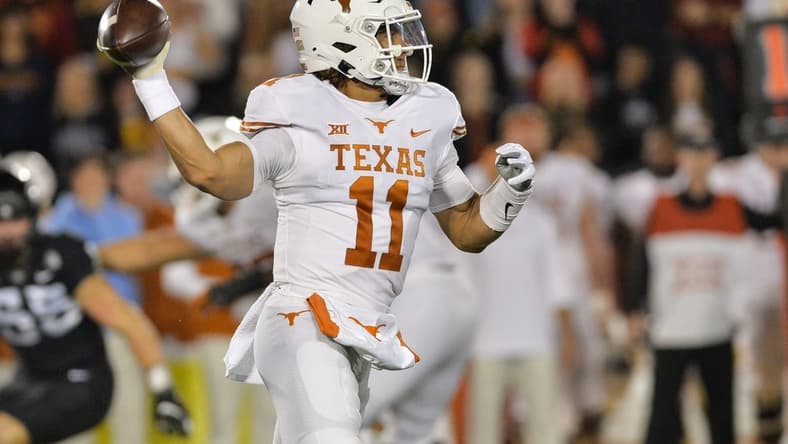 Nov 6, 2021; Ames, Iowa, USA; Texas Longhorns quarterback Casey Thompson (11) throws a pass against the Iowa State Cyclones during the first quarter at Jack Trice Stadium. Mandatory Credit: Jeffrey Becker-USA TODAY Sports