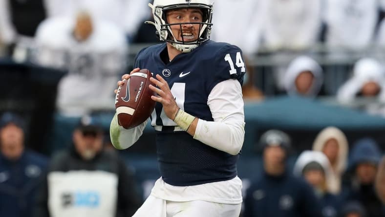 Nov 13, 2021; University Park, Pennsylvania, USA; Penn State Nittany Lions quarterback Sean Clifford (14) looks to throw a pass during the fourth quarter against the Michigan Wolverines at Beaver Stadium. Michigan defeated Penn State 21-17. Mandatory Credit: Matthew OHaren-USA TODAY Sports