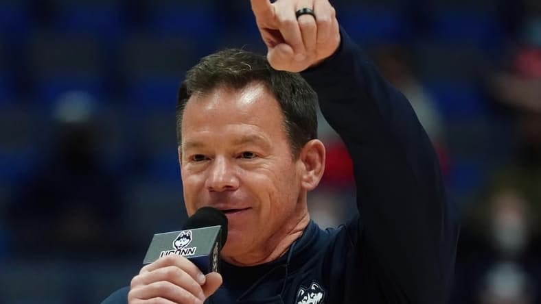 Nov 14, 2021; Hartford, Connecticut, USA; The new UConn Huskies Football head coach Jim Mora address the Huskies women   s basketball crowd during a break in the action against the Arkansas Razorbacks at XL Center. Mandatory Credit: David Butler II-USA TODAY Sports