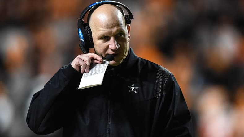 Nov 27, 2021; Knoxville, Tennessee, USA; Vanderbilt Commodores head coach Clark Lea coaches during the second half against the Tennessee Volunteers at Neyland Stadium. Mandatory Credit: Bryan Lynn-USA TODAY Sports