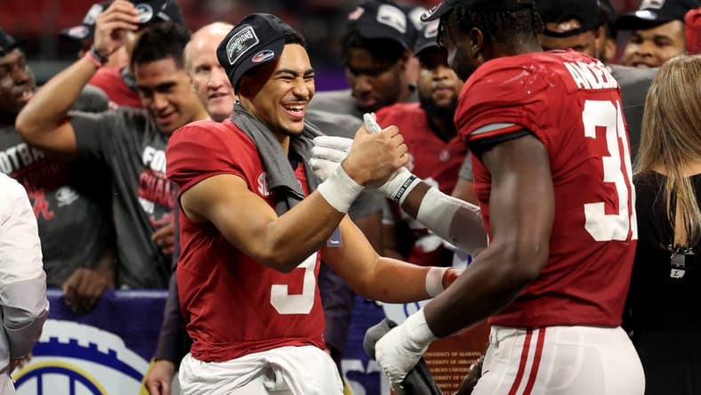 Dec 4, 2021; Atlanta, GA, USA; Alabama Crimson Tide quarterback Bryce Young (9) celebrates with linebacker Will Anderson Jr. (31) after their win during the SEC championship game after the Georgia Bulldogs at Mercedes-Benz Stadium. Mandatory Credit: Jason Getz-USA TODAY Sports
