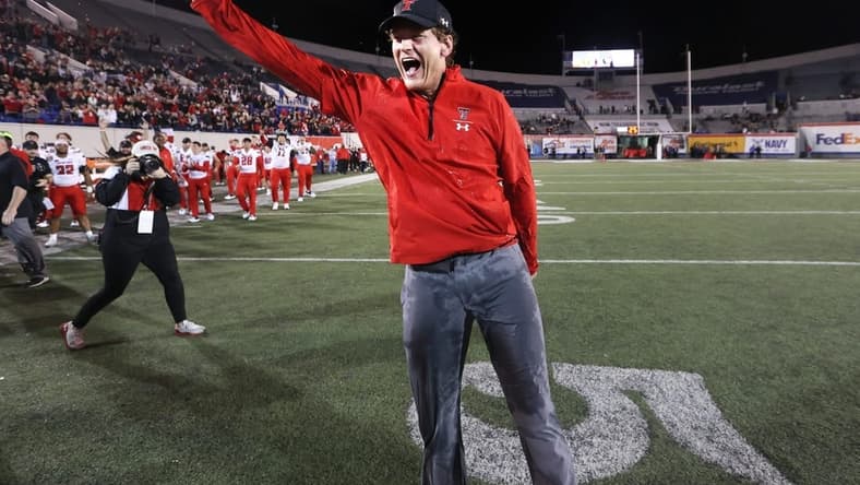 Louisiana Tech coach Sonny Cumbie (file photo) celebrates at Texas Tech in a 34-7 win over the Mississippi State Bulldogs at the AutoZone Liberty Bowl at Liberty Bowl Memorial Stadium on Tuesday, Dec. 28, 2021.

Jrca7082