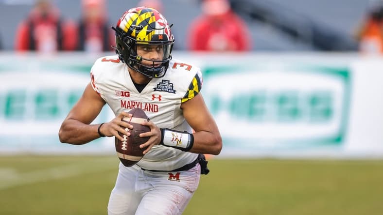 Dec 29, 2021; New York, NY, USA; Maryland Terrapins quarterback Taulia Tagovailoa (3) rolls out in the first half during the 2021 Pinstripe Bowl against the Virginia Tech Hokies at Yankee Stadium. Mandatory Credit: Vincent Carchietta-USA TODAY Sports