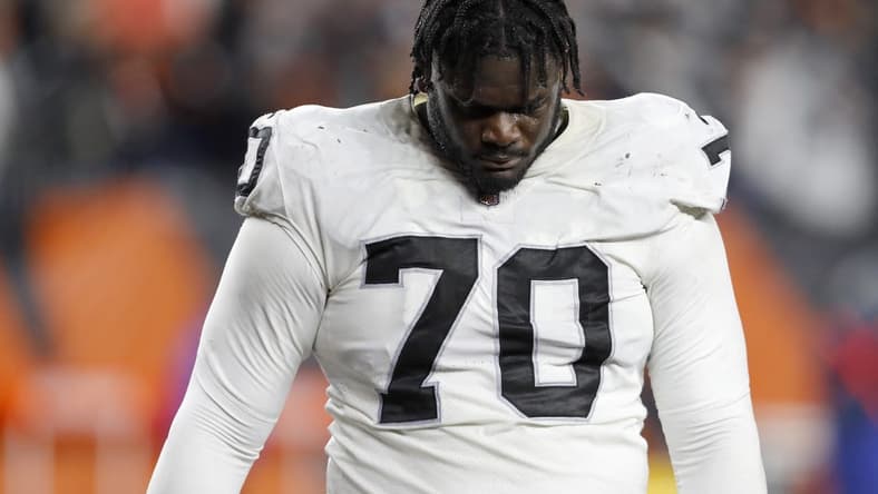 Jan 15, 2022; Cincinnati, Ohio, USA; Las Vegas Raiders guard Alex Leatherwood (70) reacts after their loss against the Cincinnati Bengals in an AFC Wild Card playoff football game at Paul Brown Stadium. Mandatory Credit: Joseph Maiorana-USA TODAY Sports