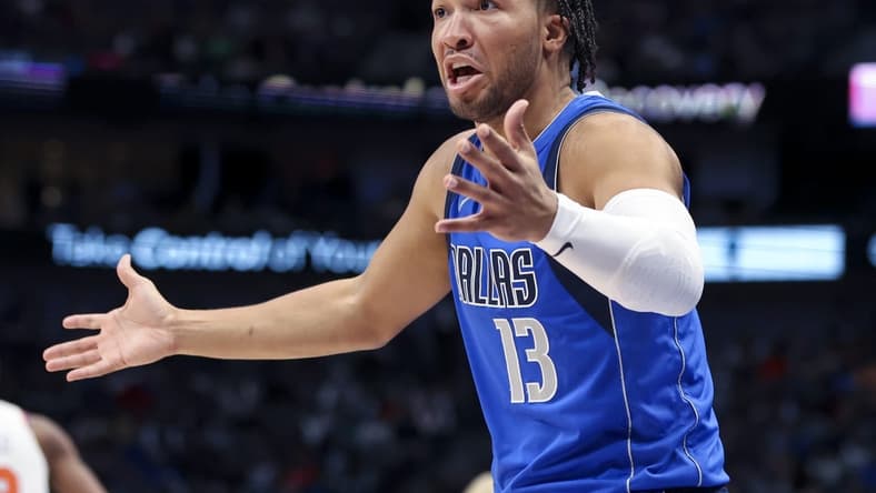 Mar 9, 2022; Dallas, Texas, USA; Dallas Mavericks guard Jalen Brunson (13) reacts during the second half against the New York Knicks at American Airlines Center. Mandatory Credit: Kevin Jairaj-USA TODAY Sports