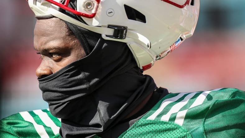 Malik Cunningham watches from the sidelines during practice at Cardinal Stadium on Sunday, April 3, 2021

Showcase34