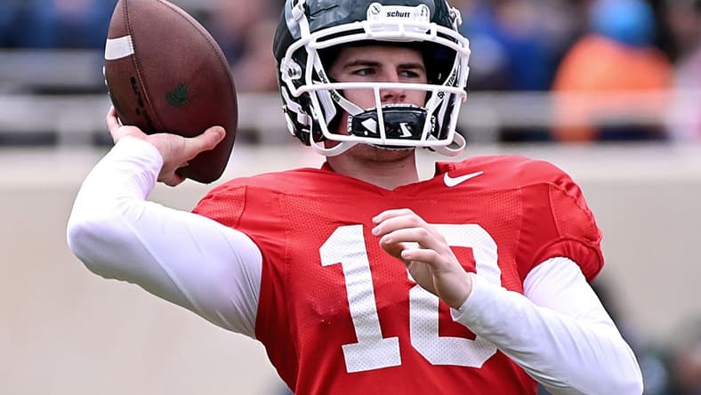 Apr 16, 2022; East Lansing, Michigan, USA;  Michigan State University Spartans quarterback Payton Thorne (10) throws upfield at Spartan Stadium. Mandatory Credit: Dale Young-USA TODAY Sports
