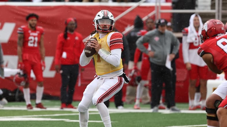 Apr 23, 2022; Salt Lake City, Utah, USA; Utah Utes junior quarterback Cameron Rising (7) looks to throw the ball in the first quarter of the Utah Spring Football Game at Rice   Eccles Stadium. Mandatory Credit: Rob Gray-USA TODAY Sports