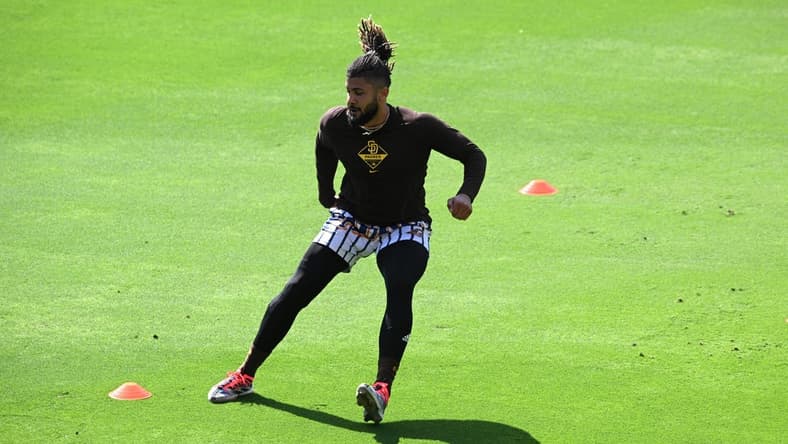 May 5, 2022; San Diego, California, USA; San Diego Padres shortstop Fernando Tatis Jr. (23) works out before the game against the Miami Marlins at Petco Park. Tatis Jr. is currently on the 60-day injured list. Mandatory Credit: Orlando Ramirez-USA TODAY Sports