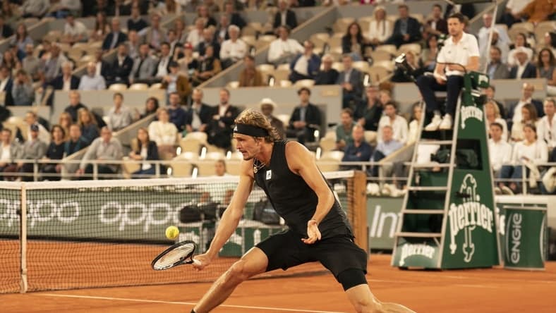 June 3, 2022; Paris, France; Alexander Zverev (GER) returns a shot during his semifinal match against Rafael Nadal (ESP)on day 13 of the French Open at Stade Roland-Garros. Mandatory Credit: Susan Mullane-USA TODAY Sports