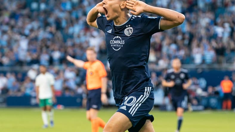 May 18, 2022; Kansas City, Kansas, USA; Sporting Kansas City forward Daniel Salloi (20) celebrates after scoring a goal against the Colorado Rapids during the first half at Children's Mercy Park. Mandatory Credit: Jay Biggerstaff-USA TODAY Sports