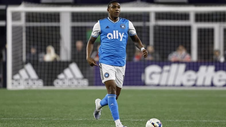Apr 16, 2022; Foxborough, Massachusetts, USA; Charlotte FC defender Christian Makoun (14) during the first half against the New England Revolution at Gillette Stadium. Mandatory Credit: Winslow Townson-USA TODAY Sports