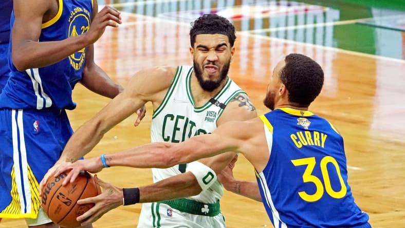 Jun 16, 2022; Boston, Massachusetts, USA; Boston Celtics forward Jayson Tatum (0) drives to the basket against Golden State Warriors guard Stephen Curry (30) during the third quarter in game six of the 2022 NBA Finals at TD Garden. Mandatory Credit: Kyle Terada-USA TODAY Sports
