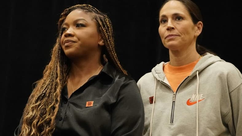 Jul 8, 2022; Chicago, IL, USA; Cherelle Griner (left) spouse of Brittney Griner and Sue Bird during a press conference addressing the detention of Brittney Griner in Russia at Hyatt Regency at McCormick Place. Mandatory Credit: David Banks-USA TODAY Sports