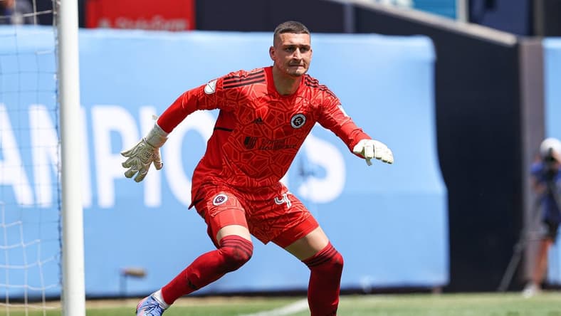 Jul 9, 2022; New York, New York, USA; New England Revolution goalkeeper Djordje Petrovic (99) follows the ball during the second half against New York City FC at Yankee Stadium. Mandatory Credit: Vincent Carchietta-USA TODAY Sports