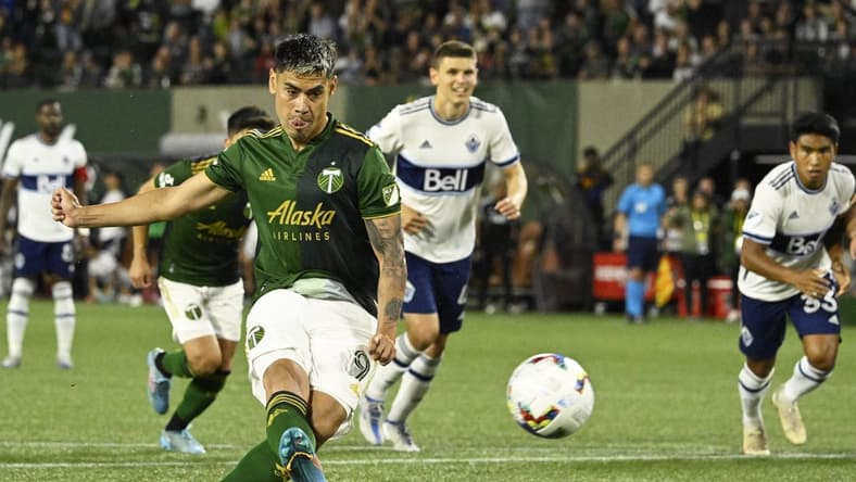 Jul 17, 2022; Portland, Oregon, USA; Portland Timbers forward Felipe Mora (9) scores a goal off a penalty kick during the second half against the Portland Timbers at Providence Park. The game ended tied 1-1. Mandatory Credit: Troy Wayrynen-USA TODAY Sports