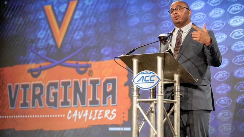 Jul 21, 2022; Charlotte, NC, USA;  Virginia Head Coach Tony Elliott talks to the media during the second day of ACC Media Days at the Westin Hotel in Charlotte, NC. Mandatory Credit: Jim Dedmon-USA TODAY Sports