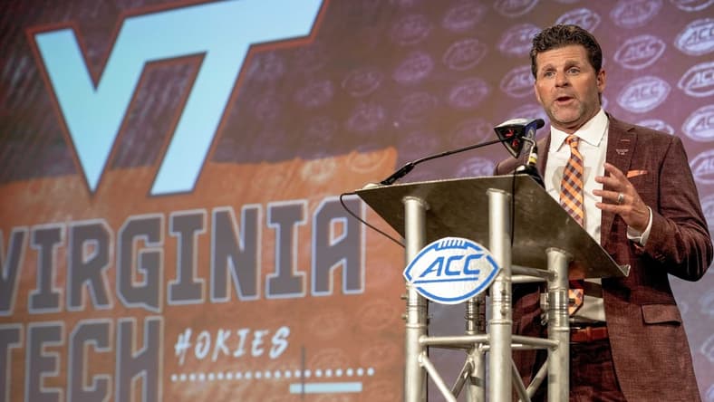 Jul 21, 2022; Charlotte, NC, USA;  Virginia Tech Head Coach Brent Pry talks to the media during the second day of ACC Media Days at the Westin Hotel in Charlotte, NC. Mandatory Credit: Jim Dedmon-USA TODAY Sports