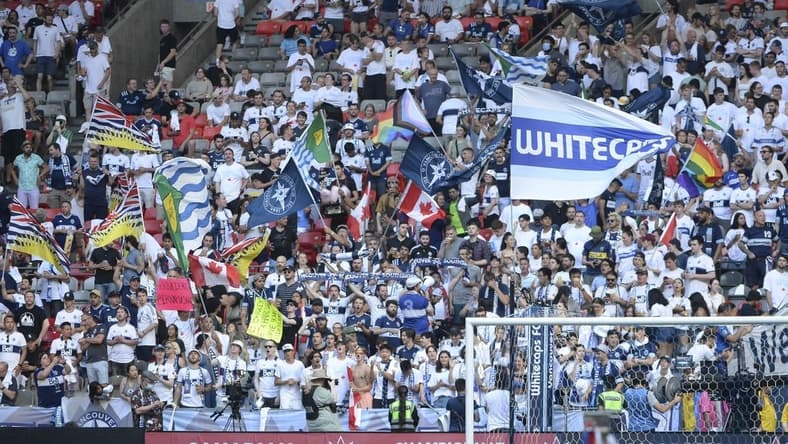 Jul 26, 2022; Vancouver, BC, Canada;  Vancouver Whitecaps FC fans cheer before the start of the first half against Toronto FC at BC Place. Mandatory Credit: Anne-Marie Sorvin-USA TODAY Sports