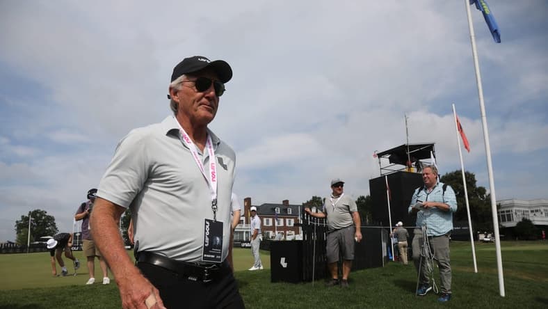 July 28, 2022; Bedminster, NJ, USA; Greg Norman heads to the first tee from putting practice to start the LIV Pro Am Tournament at Trump National in Bedminster, NJ on July 28, 2022. at Trump National in Bedminster, NJ on July 28, 2022. Mandatory Credit: Chris Pedota-USA TODAY NETWORK