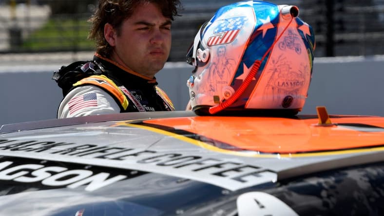 NASCAR Xfinity Series driver Noah Gragson (9) stands by his car Friday, July 29, 2022, during qualifying for the Pennzoil 150 at the Brickyard at Indianapolis Motor Speedway.