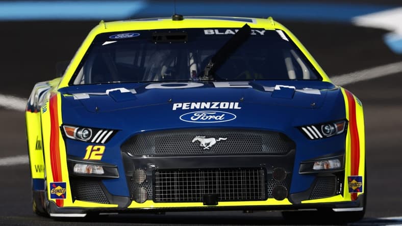 Jul 30, 2022; Speedway, Indiana, USA; NASCAR Cup Series driver Ryan Blaney (12) during practice at Indianapolis Motor Speedway Road Course. Mandatory Credit: Mike Dinovo-USA TODAY Sports