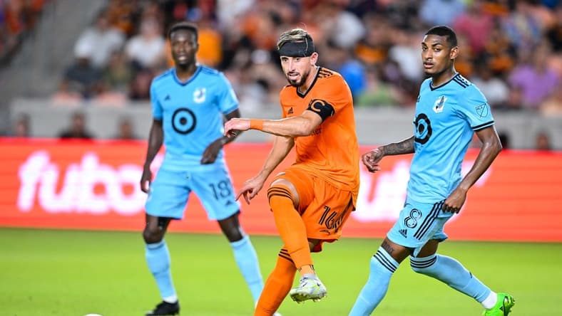 Jul 23, 2022; Houston, Texas, USA; Houston Dynamo FC midfielder Hector Herrera (16) passes the ball during the second half against the Minnesota United FC at PNC Stadium. Mandatory Credit: Maria Lysaker-Houston Dynamo FC-USA TODAY Sports